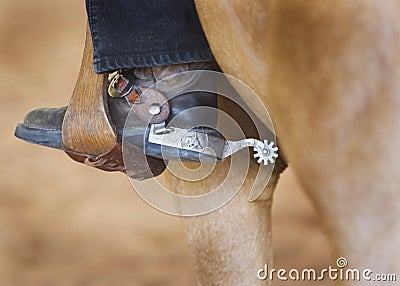 Western spur and stirrup Stock Photo