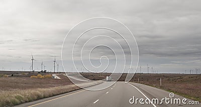 Western Texas highway with wind farm, wind turbines Editorial Stock Photo