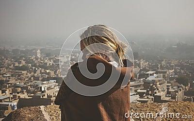 Western woman exploring Jaisalmer Fort, Rajasthan, India Stock Photo