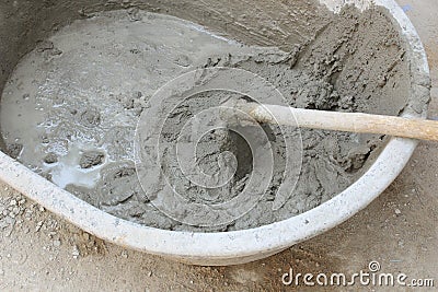 Wet cement mixed for building at construction site. Stock Photo