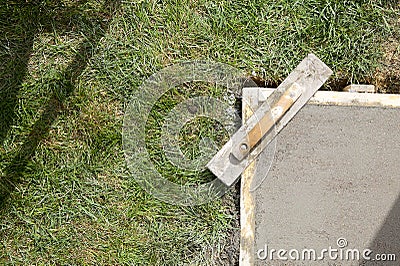 Wet cement slab form work and trowel float Stock Photo