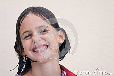 Wet child with cheesy grin Stock Photo