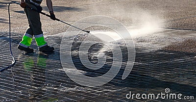 Wet cleaning of street. Stock Photo