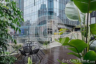 Wet planked terrace in rainy city Editorial Stock Photo