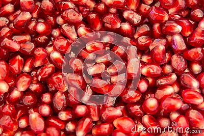Wet pomegranate seeds background Stock Photo