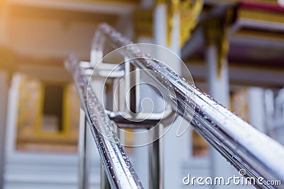 The Wet Railings Of Stainless Steel under The Rain Drops Stock Photo