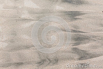Wet sand patterns Stock Photo
