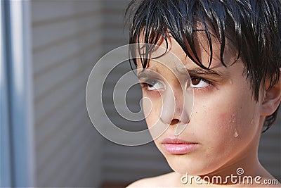 Wet, Sullen Child Stock Photo