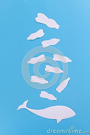 a whale of garbage plastic floating in the ocean Stock Photo