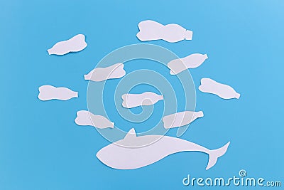 a whale of garbage plastic floating in the ocean Stock Photo