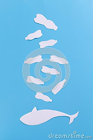 a whale of garbage plastic floating in the ocean Stock Photo