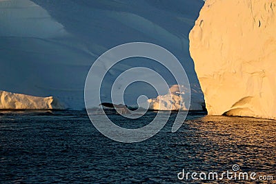 Whale watching in a Ilulissat midnight Stock Photo