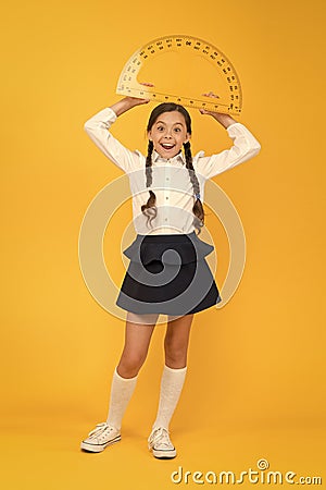 What angle you look. stem class. Math science. back to school. Mathematics education. Kid in uniform on yellow Stock Photo