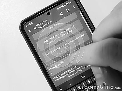 A person typing hello ChatGP at work. ChatGPT is an Artificial intelligence chatbot service provided by OpenAI Editorial Stock Photo