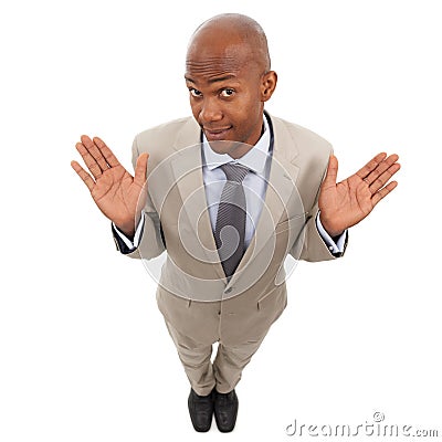 What can I say, Im a businessma. A handsome african american businessman isolated on a white background and shrugging. Stock Photo