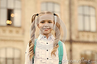 What do you know. First day of school. Happy schoolgirl urban background. Little schoolgirl back to school. Small Stock Photo