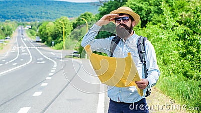 What is there. Tourist with map see familiar landmark. Seems finally got destination point. Tourist try to recognize Stock Photo