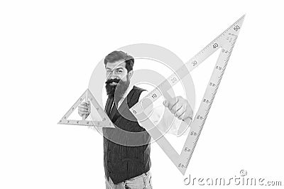 What is triangle. Bearded man hold triangles isolated on white. School teacher smile with geometric triangles. Geometry Stock Photo