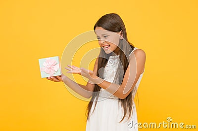 What is it. Unhappy child. Stop consumerism. Conscious purchase. Shopping concept. Portrait girl. Birthday gift. Child Stock Photo
