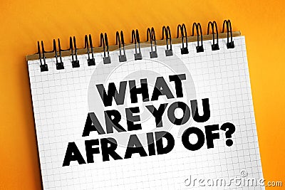 What Are You Afraid Of? text on notepad, concept background Stock Photo