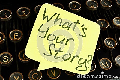 What is your story inscription on the old typewriter. Storytelling concept Stock Photo