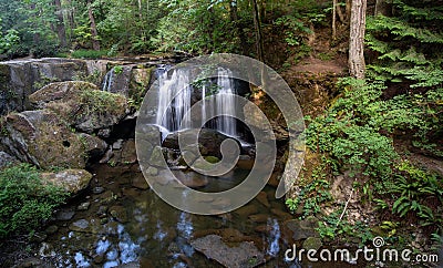 Whatcom creek and bridge at whatcom Falls park in Bellingham Washington Stock Photo