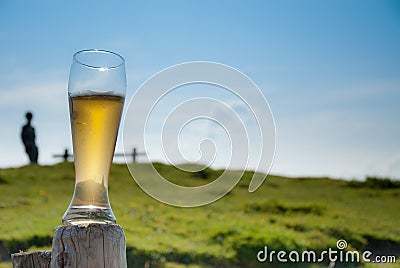 Wheat beer on wooden pole Stock Photo