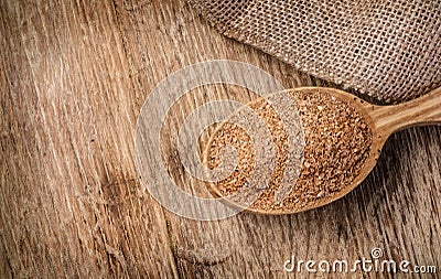 Wheat bran in wooden spoon Stock Photo