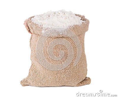 Wheat flour in burlap sack bag on white background Stock Photo