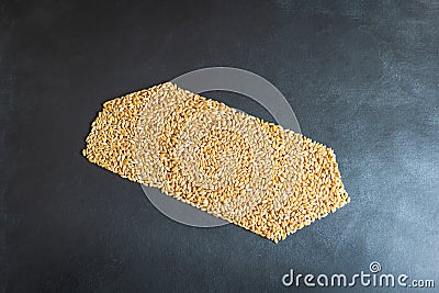 wheat grain gold bar shape concept overhead view Stock Photo