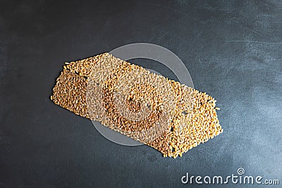 wheat grain gold bar shape concept overhead view Stock Photo