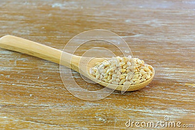 Wheat grains wooden spoon Stock Photo