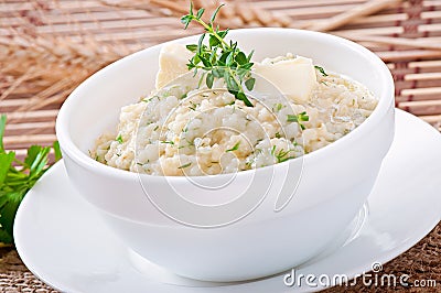 Wheat porridge with herbs Stock Photo