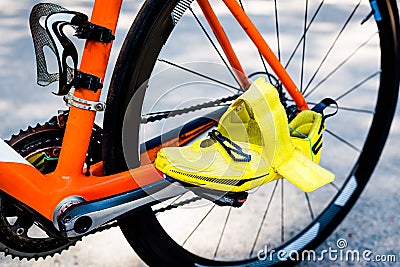 Wheel of the bicycle,orange frame,yellow cycling Stock Photo