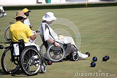 Wheel Chair Lawn Bowls for Disabled Persons (Men) Stock Photo