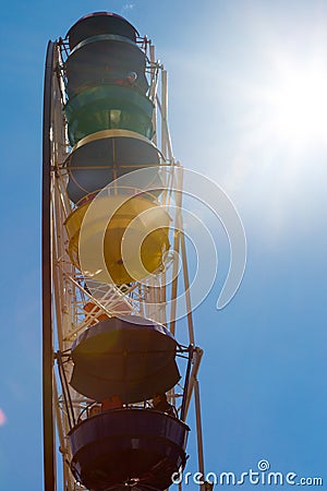 Wheel colorful carousel on blue clear sky background Stock Photo