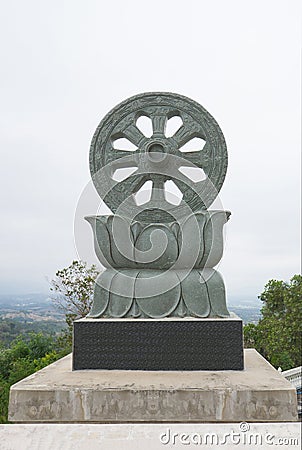 Wheel of the Dharma symbol of Buddhism Stock Photo