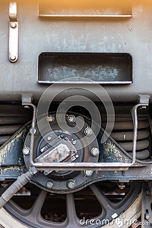 Wheel of an old train germany swiss detail iron steel bolts transport history antique Stock Photo