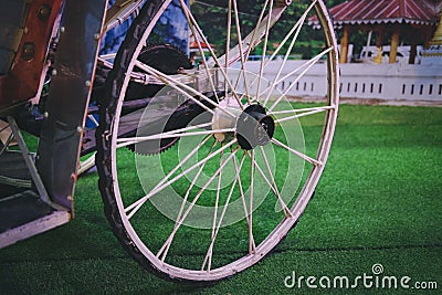 Wheel of old vintage retro asian tricycle Stock Photo