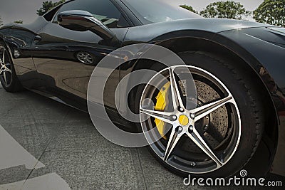 Wheel of supercar Stock Photo