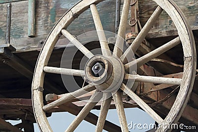 A Wheel and Undercarriage of a Buckboard Wagon Stock Photo