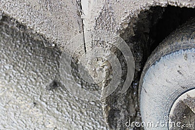 Wheel well of a vehicle covered in clay Stock Photo