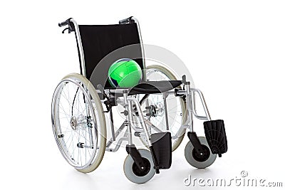 Wheelchair with ball Stock Photo