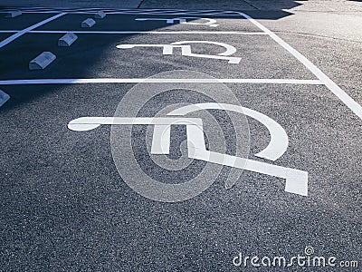 Wheelchair Handicap Sign at Parking lot Stock Photo