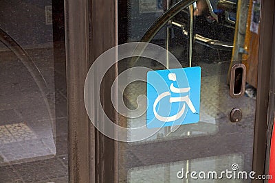 Wheelchair sign on a public bus Stock Photo