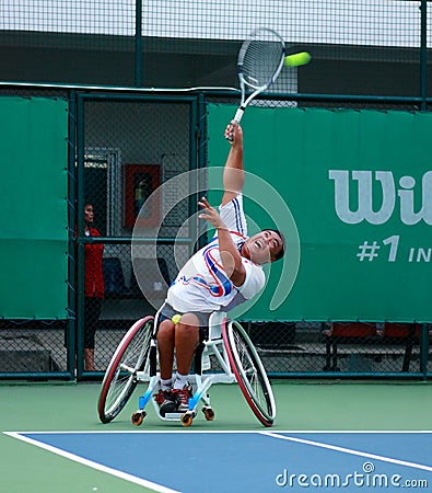 A wheelchair tennis player during a tennis championship match, t Editorial Stock Photo