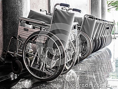 Wheelchairs parked together. Stock Photo