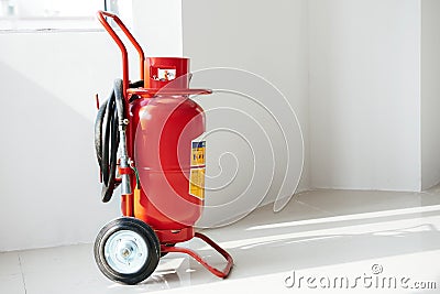 Wheeled fire extinguisher Stock Photo