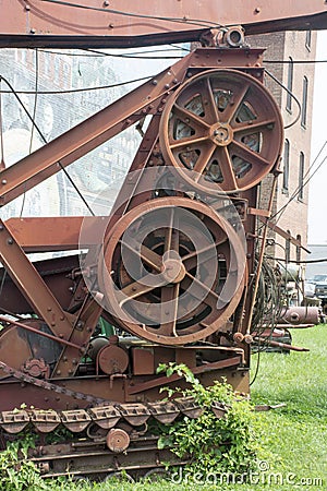 Drive system on antique drilling machine Stock Photo