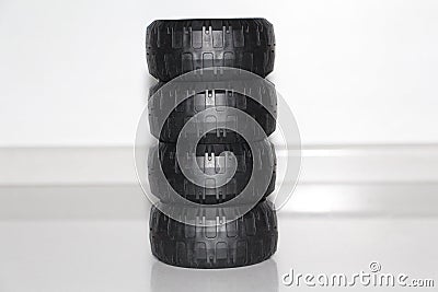 The wheels are removed from the car, the wheels are rubber toy. Stock Photo